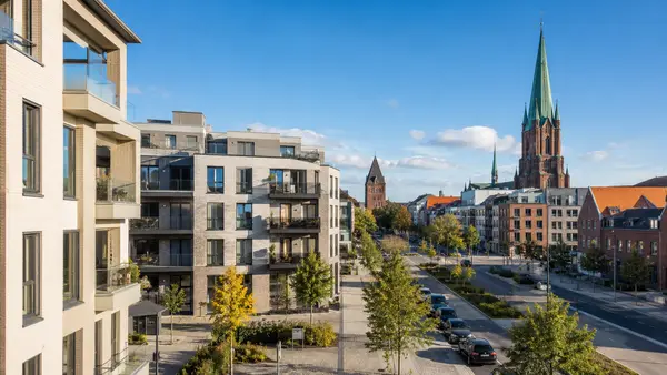 KI-generierte Stadtansicht mit typischen Merkmalen von Neumünster
